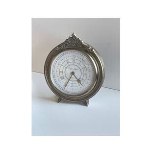 Painted metal clock in a muted gold tone Vintage Style